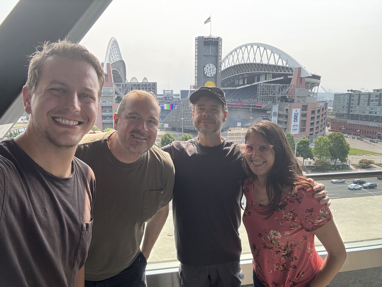 Steve Yegge with Sourcegraph teammates on a balcony overlooking Lumen Field in Seattle